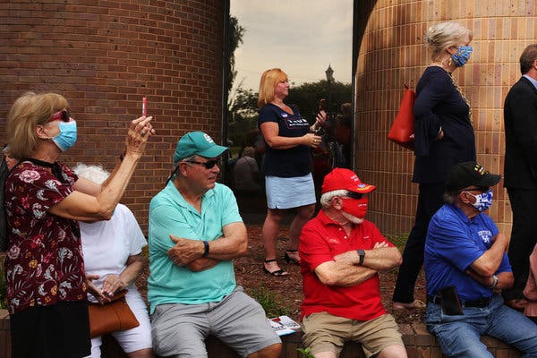 Only a handful of people wore masks at the event.